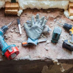 Gloves and tools on a construction job